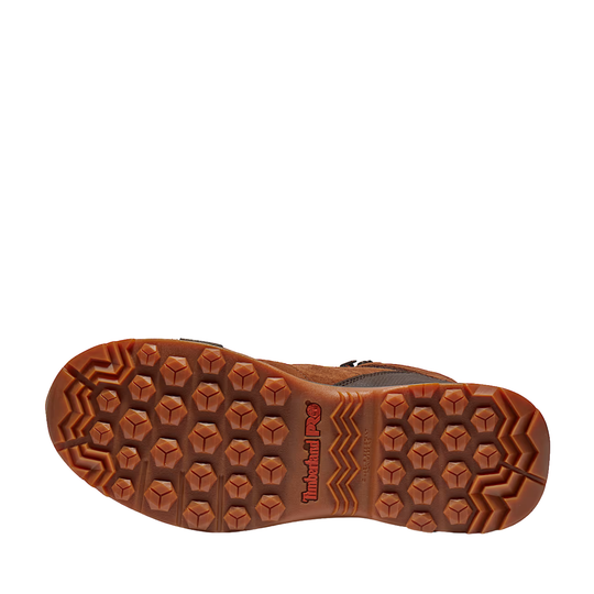 Brown boot sole with tread pattern on a white background