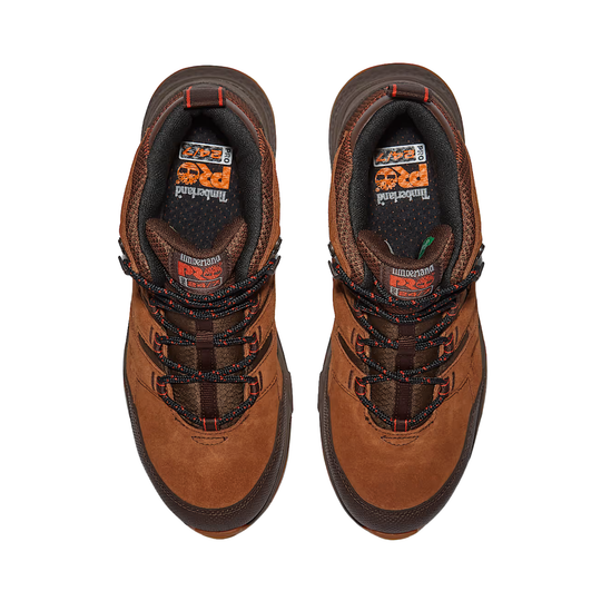 Pair of brown work boots with visible branding on a white background