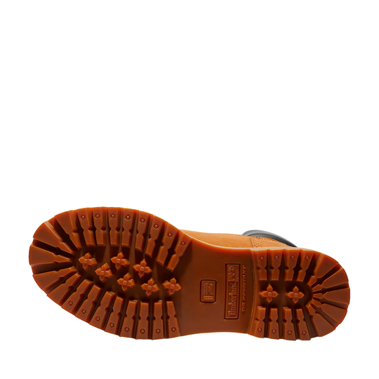Close-up of a brown boot sole on a white background
