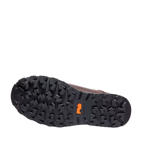 Black lugged work boot outsole with orange Timberland PRO logo