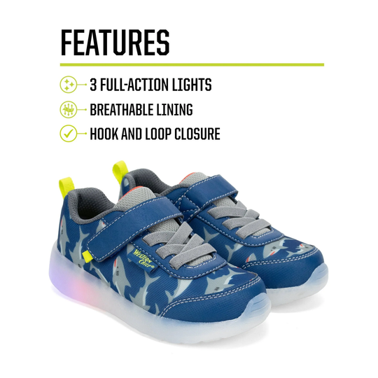 Blue children's sneakers with star pattern on a white background, featuring text about shoe features.