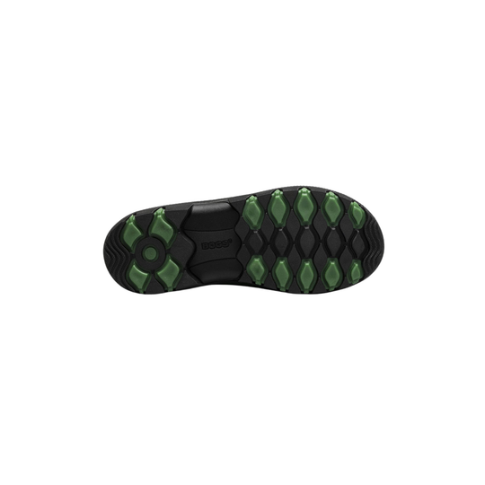 Close-up of a black and green sole on a white background