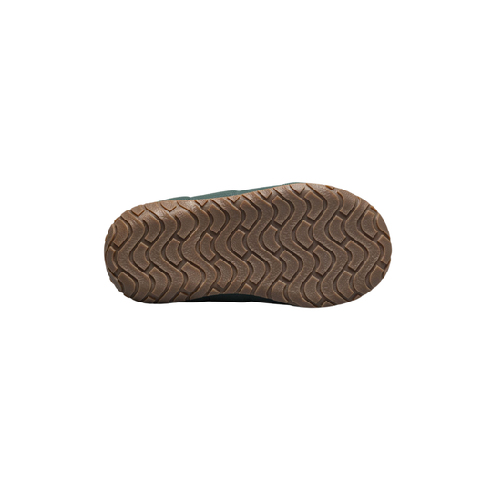 Close-up of a brown shoe sole on a white background