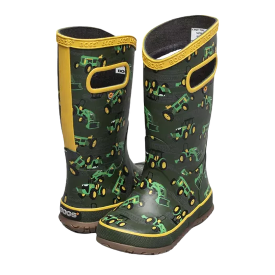 Green children's rain boots with tractor pattern on a white background