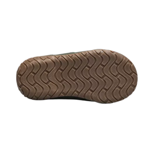 Close-up of a brown shoe sole on a white background