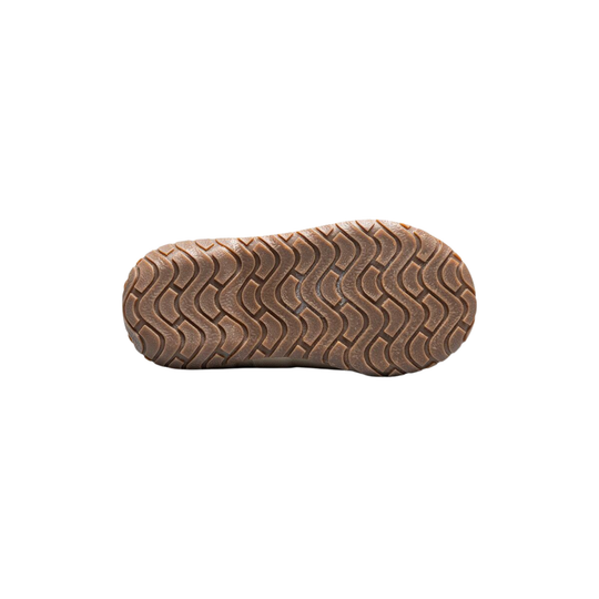 Brown sole of a shoe on a white background
