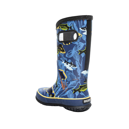 Blue children's rain boot with shark pattern on a white background