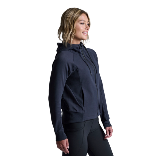 Woman wearing a navy blue hoodie on a white background