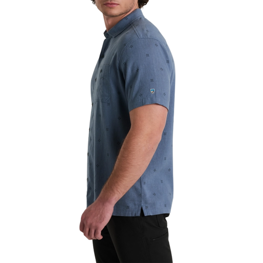 blue button up shirt with black patterns
