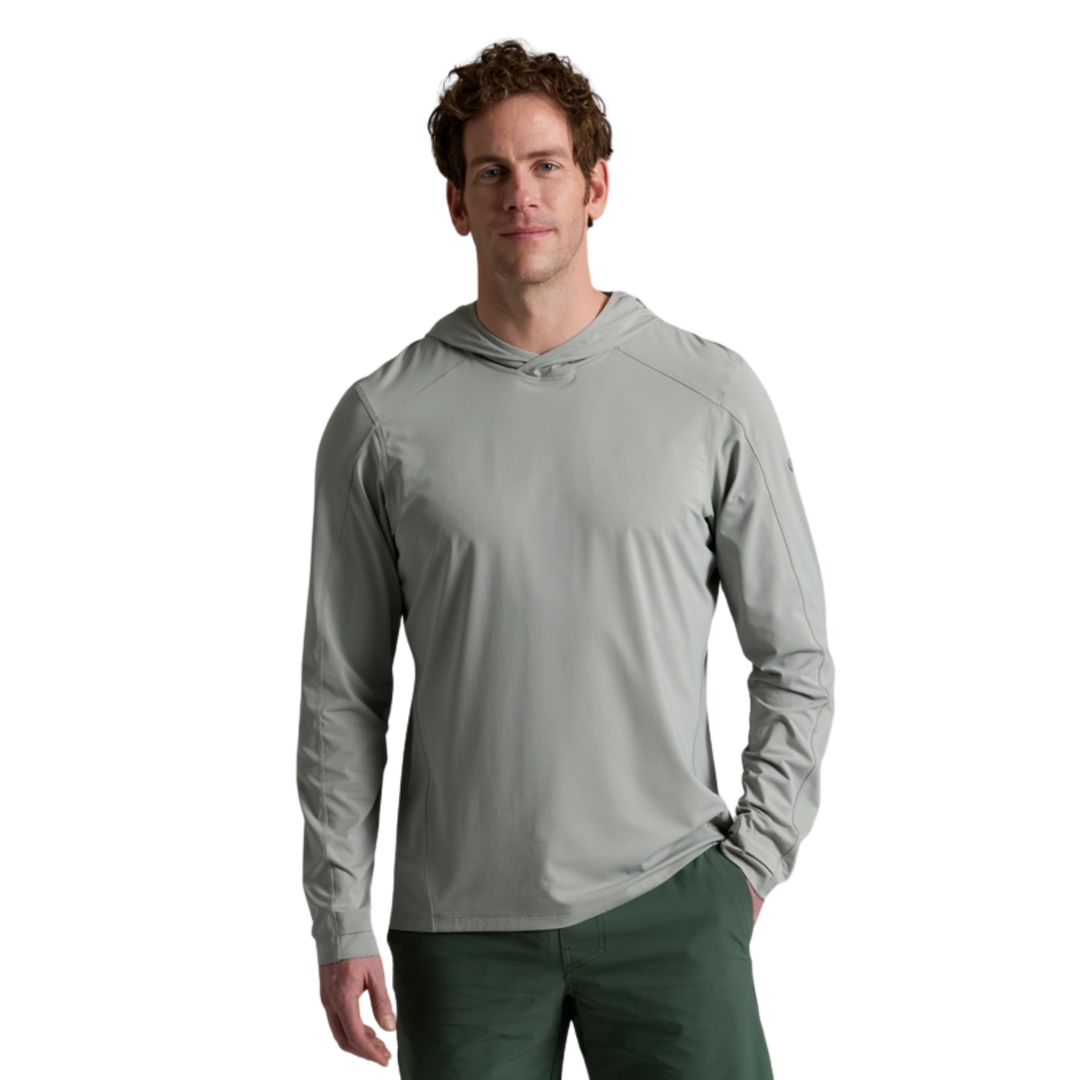 Man wearing a gray long-sleeve hoodie on a white background