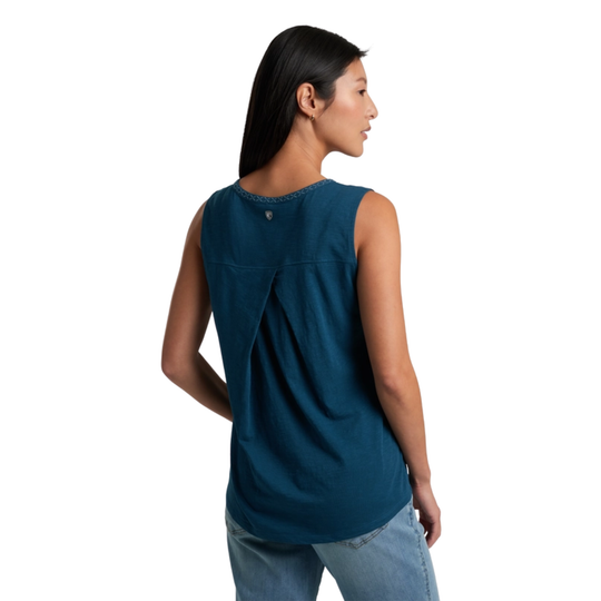 Woman wearing a blue sleeveless top on a white background