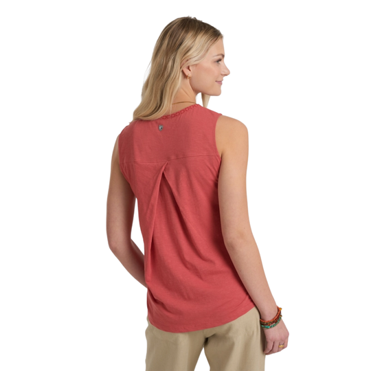 Woman wearing a red sleeveless top on a white background