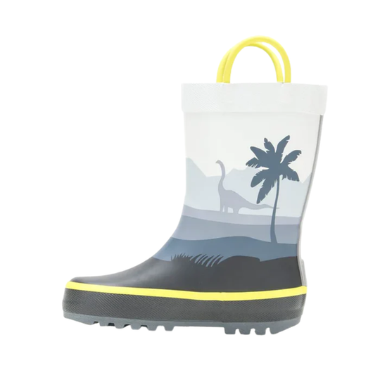 Children's rain boot with dinosaur and palm tree design on a white background