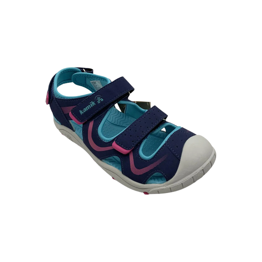 Navy and blue sandal with pink accents on a white background