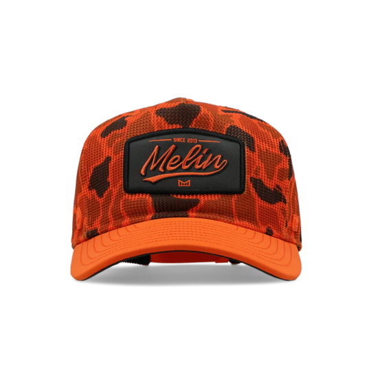 Orange and black camouflage cap with a brand logo on a white background
