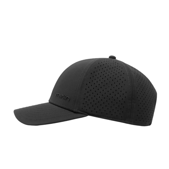 black cap with perforated design on a white background