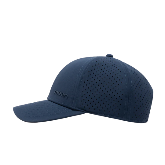 blue cap with perforated design on a white background