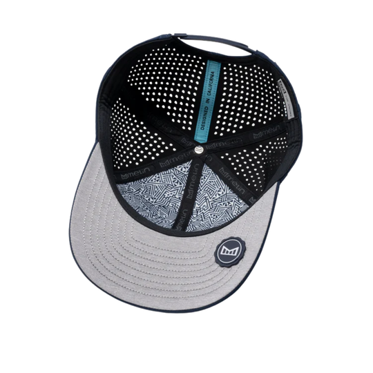 Black and gray cap with a patterned visor on a white background