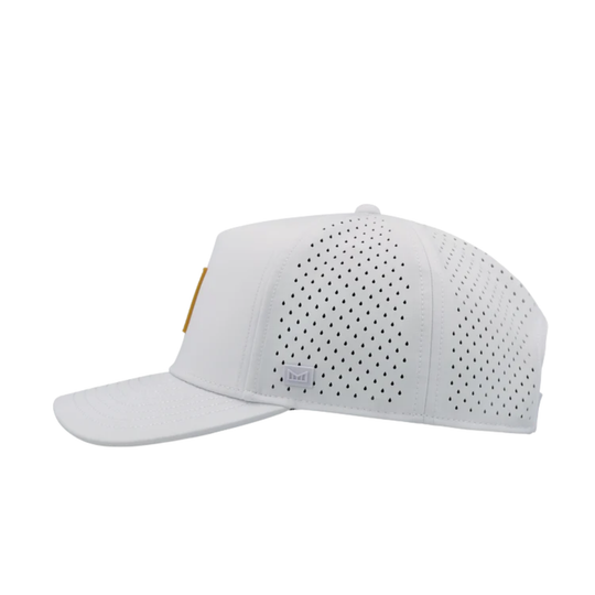 White cap with perforated design on a white background