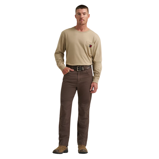 Man wearing a beige long-sleeve shirt and brown pants on a white background