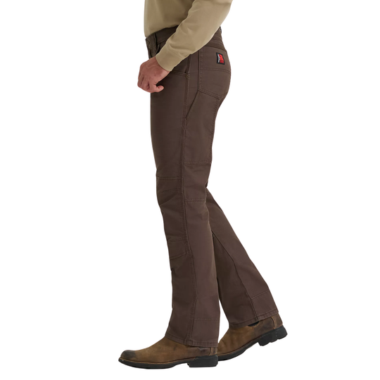 Brown pants worn by a person on a white background