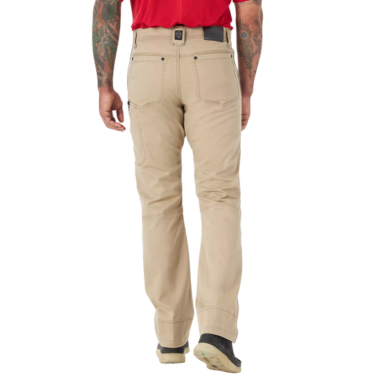 Person wearing beige pants on a white background