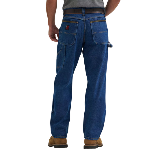 Blue jeans worn by a person on a white background