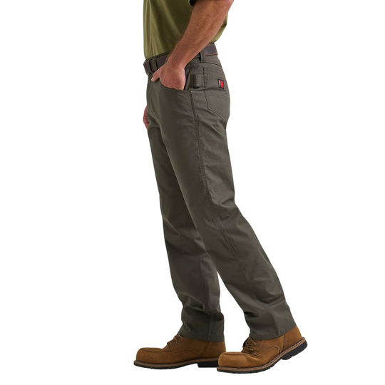 Person wearing gray pants with a white background