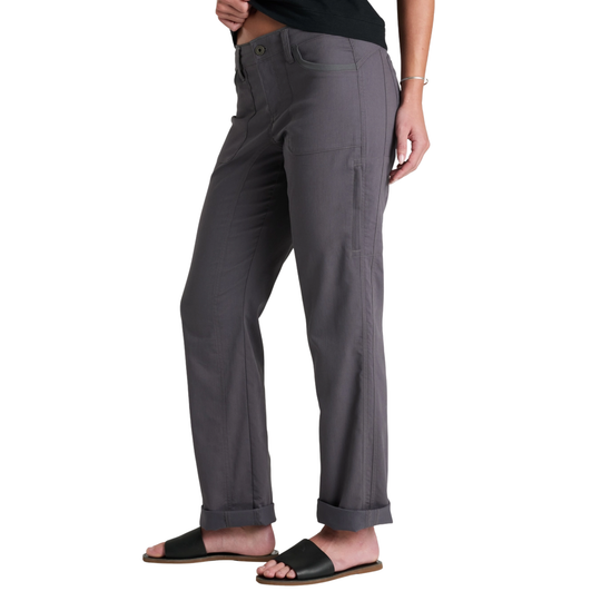 Gray pants worn by a person on a white background