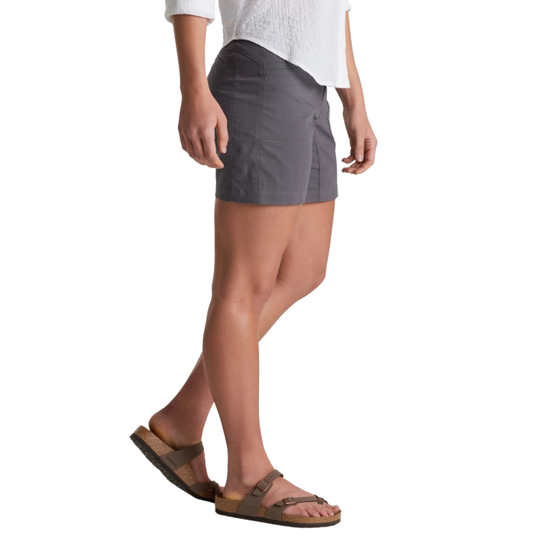 Person wearing a gray skirt on a white background