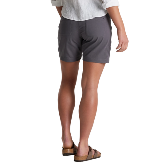 Person wearing gray shorts on a white background