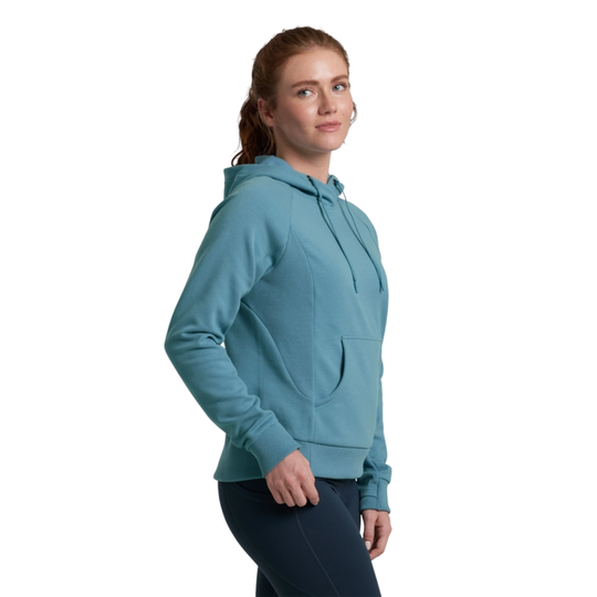 Woman wearing a teal hoodie on a white background