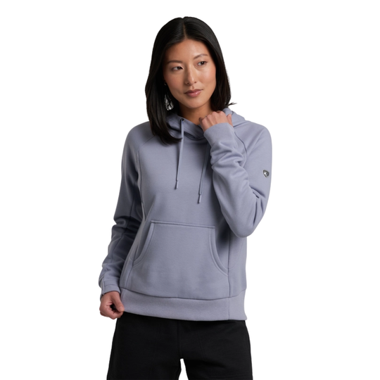 Woman wearing a light gray hoodie on a white background