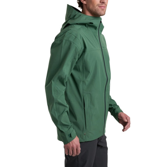 Green raincoat worn by a person on a white background