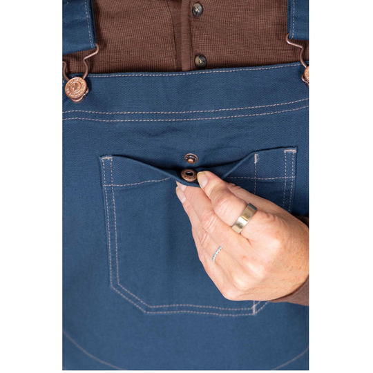 Blue canvas overall bib with snap-front chest pocket and large front pocket