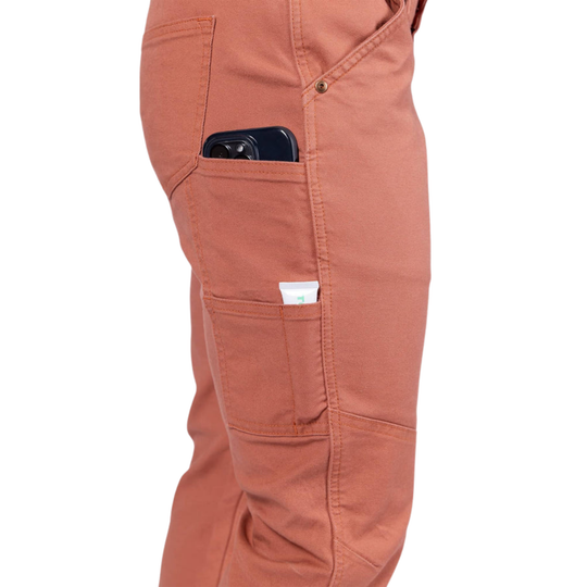 Brown pants with a phone in the pocket on a white background