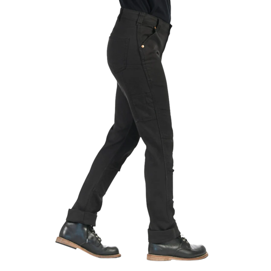 Person wearing black pants and black shoes on a white background