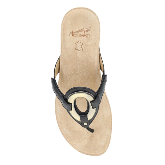 Beige sandal with black strap on a white background