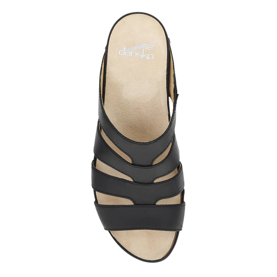 Black sandal with cut-out design on a white background