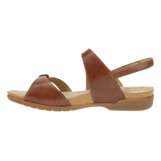 Brown sandal with cork sole on a white background