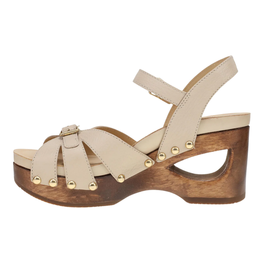 Beige sandal with wooden platform on a white background