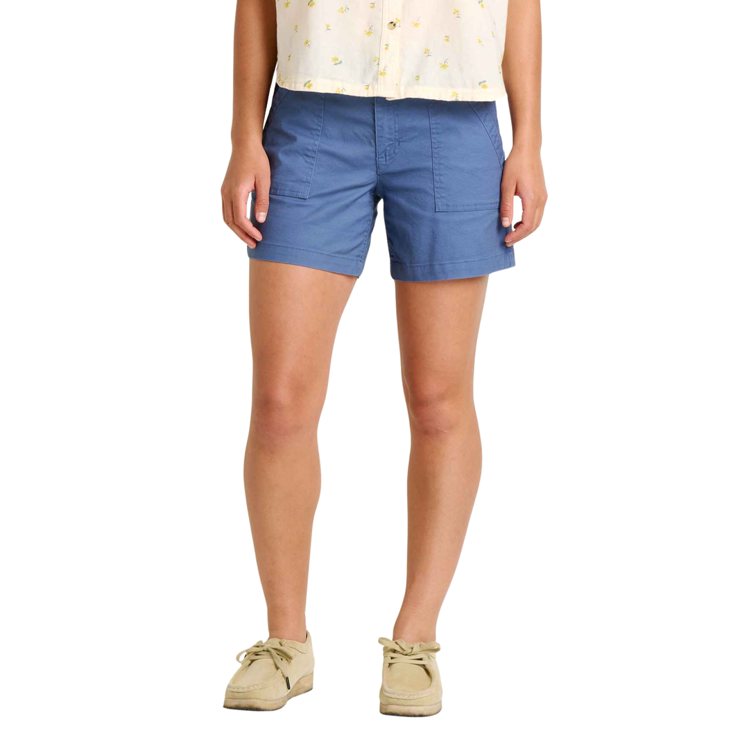Person wearing blue shorts on a white background