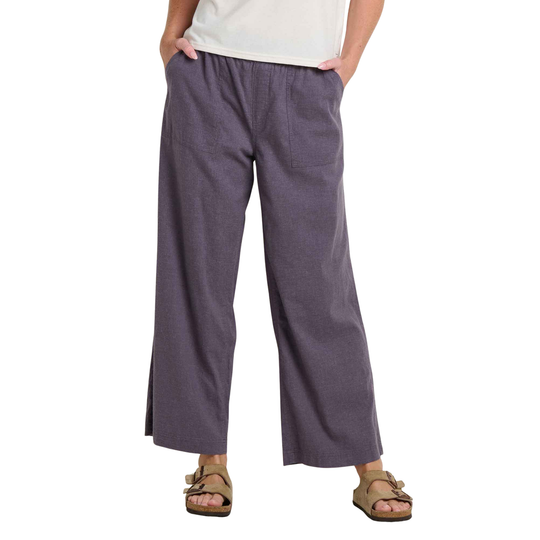 Women’s wide-leg gray pants with patch pockets and cropped hem, worn with tan sandals