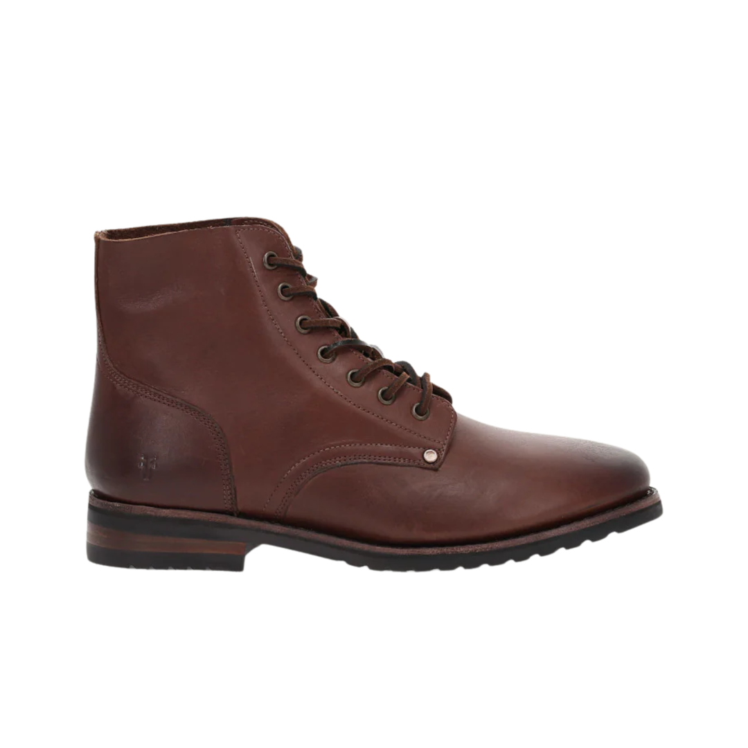 Brown leather boot on a white background