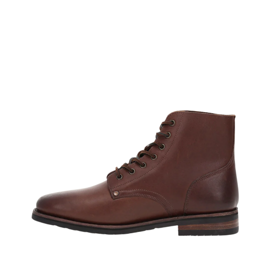 Brown leather boot on a white background