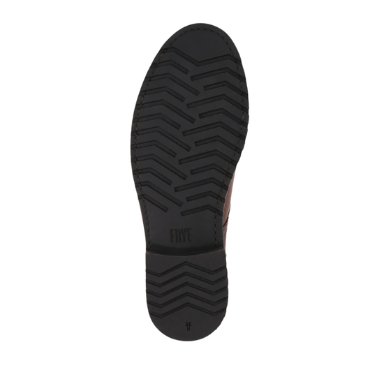 Black sole of a shoe with a brand logo on a white background