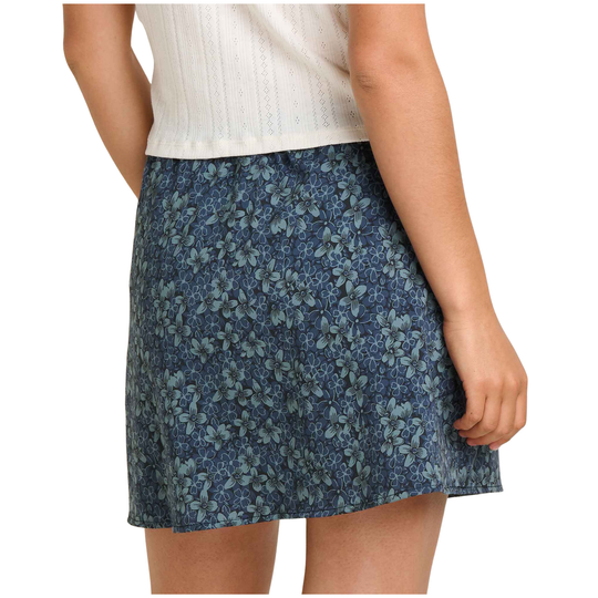 Blue floral skirt worn by a person on a white background
