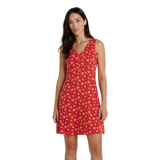 Woman wearing a red floral dress on a white background