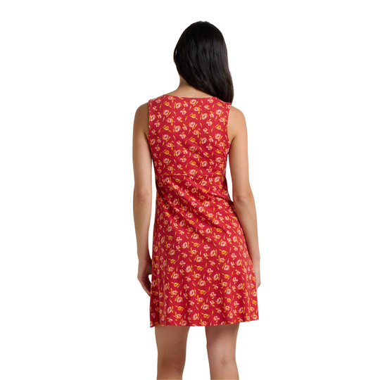 Woman wearing a red floral dress on a white background
