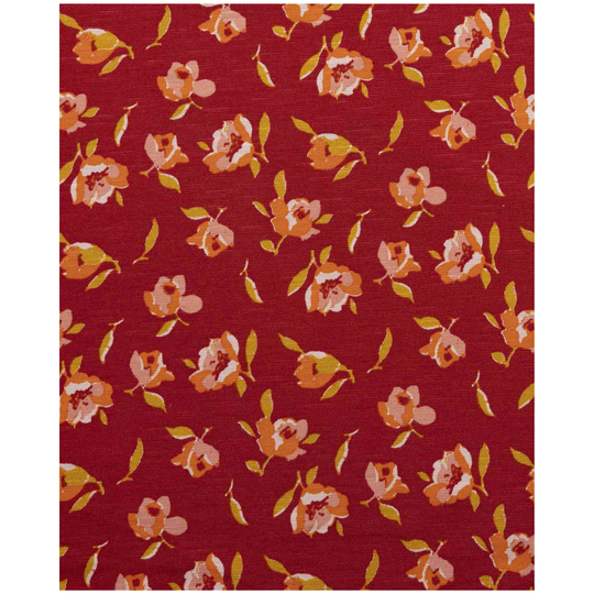 Floral pattern on a red fabric background